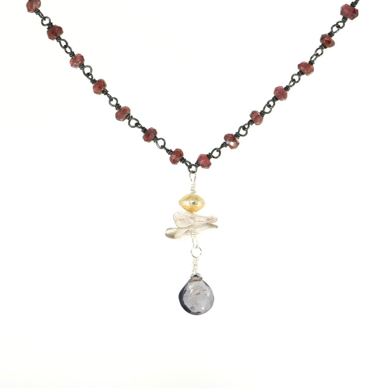 Garnet rosary necklace on oxidized sterling silver with smoky quartz and iolite drops