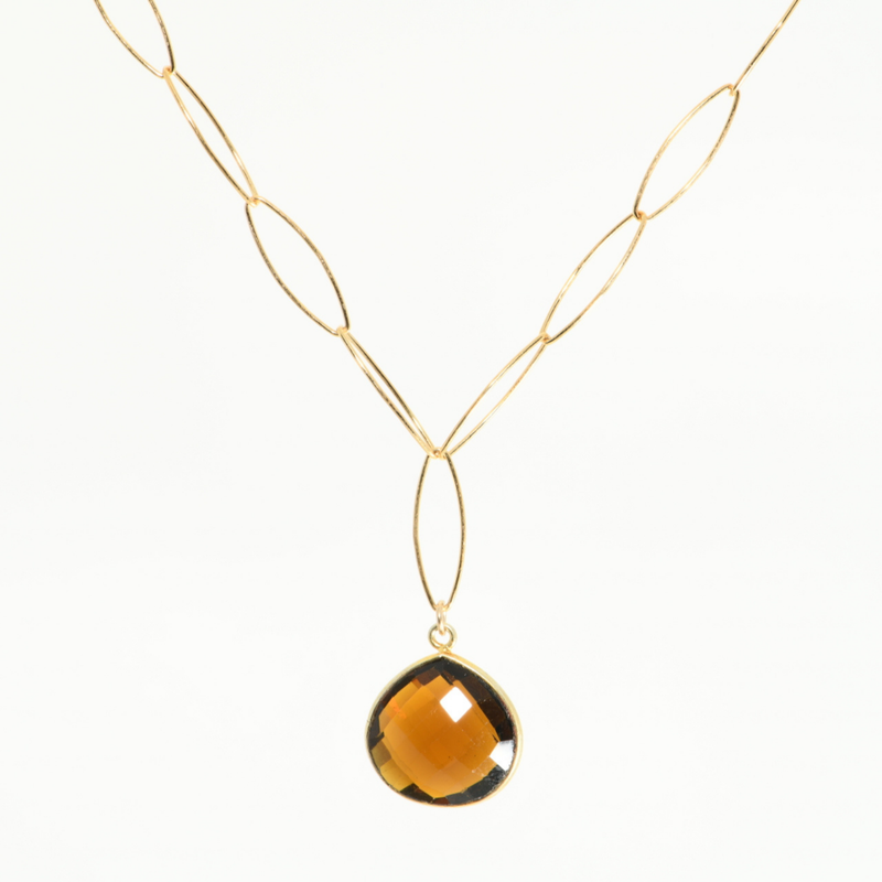 Hessonite garnet teardrop in gold-filled bezel on gold-filled marquise chain