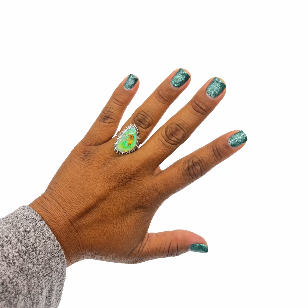 Australian opal teardrop ring in beaded sterling silver bezel, front view