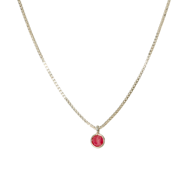 Tiny ruby pendant on sterling silver box chain, front view