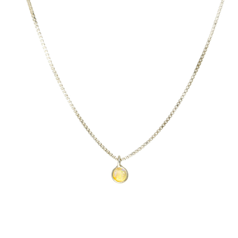 Tiny Ethiopian opal pendant on sterling silver box chain, front view
