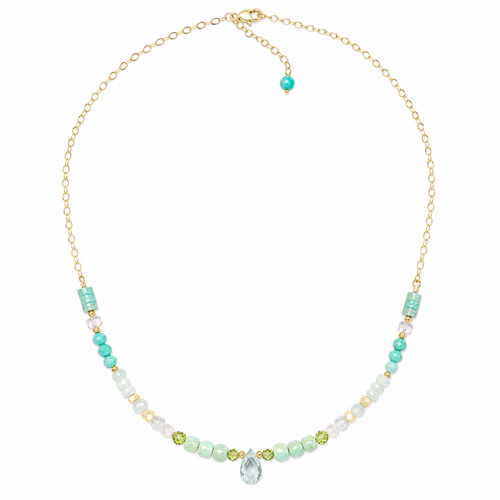 Woman wearing an amazonite, moonstone and aquamarine beaded necklace