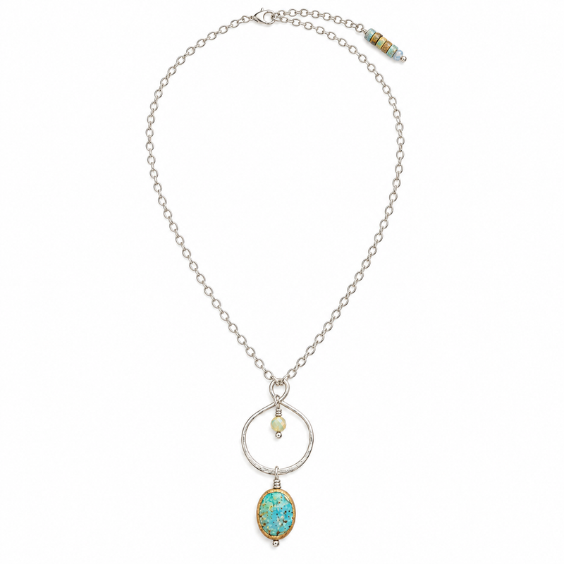 Turquoise infinity loop pendant necklace on a sterling silver chain, full view