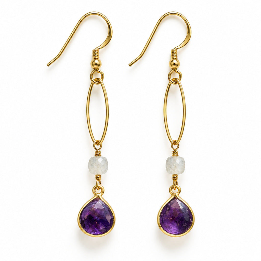 Woman wearing gold-filled marquise dangle earrings with amethyst and moonstone.