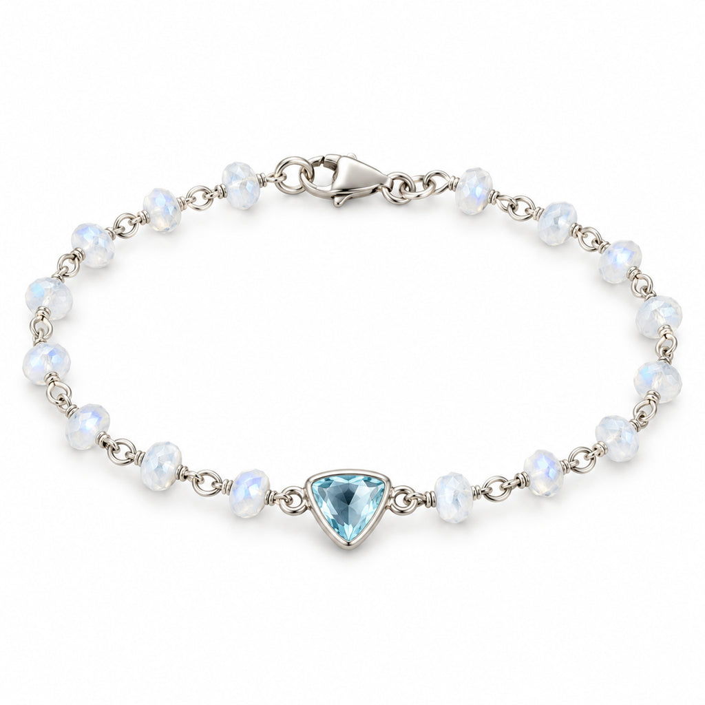 Aqua blue topaz and moonstone sterling silver bracelet worn on the wrist