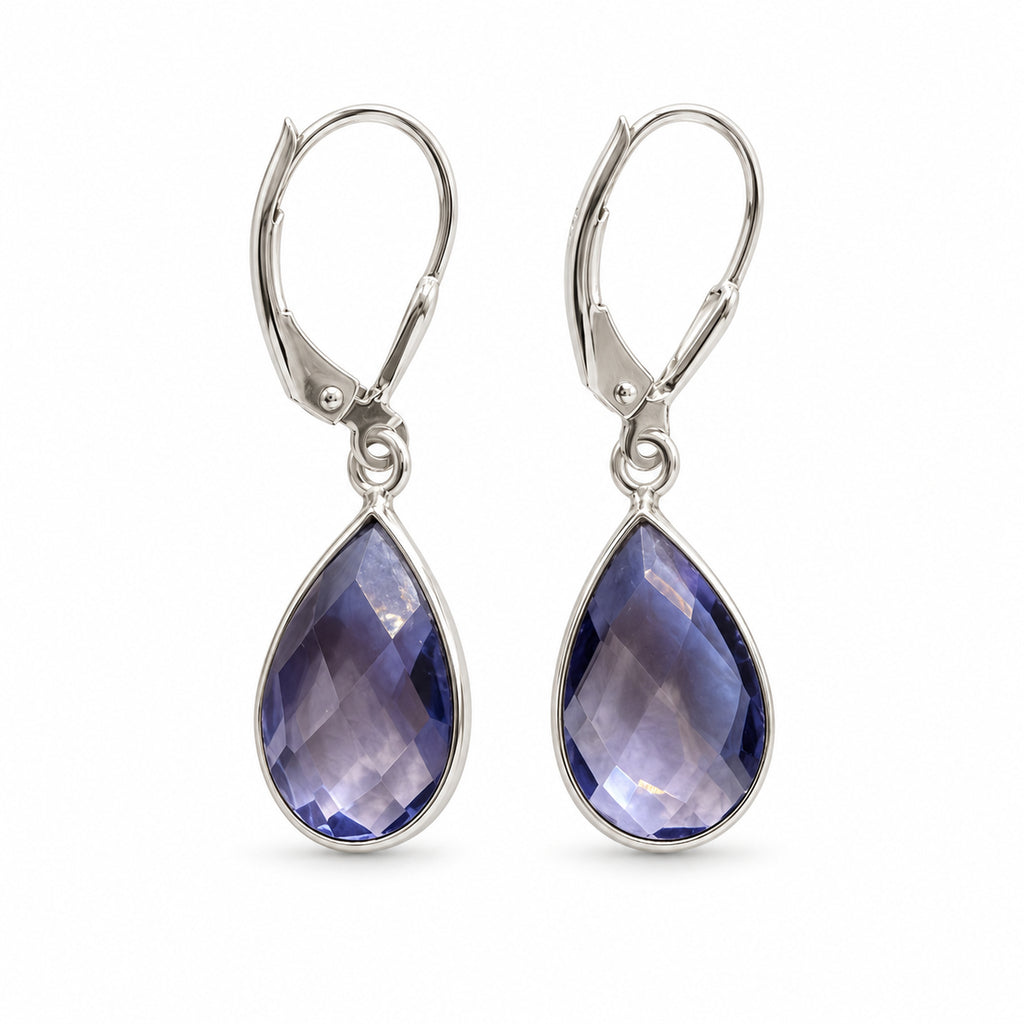 Woman wearing iolite teardrop sterling silver leverback earrings