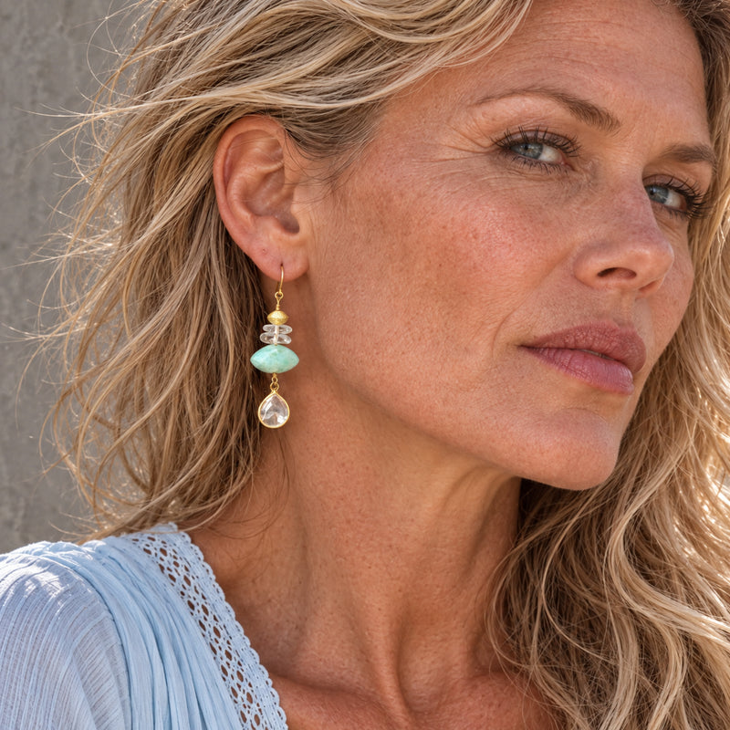 Woman wearing larimar marquise drop gold-filled earrings