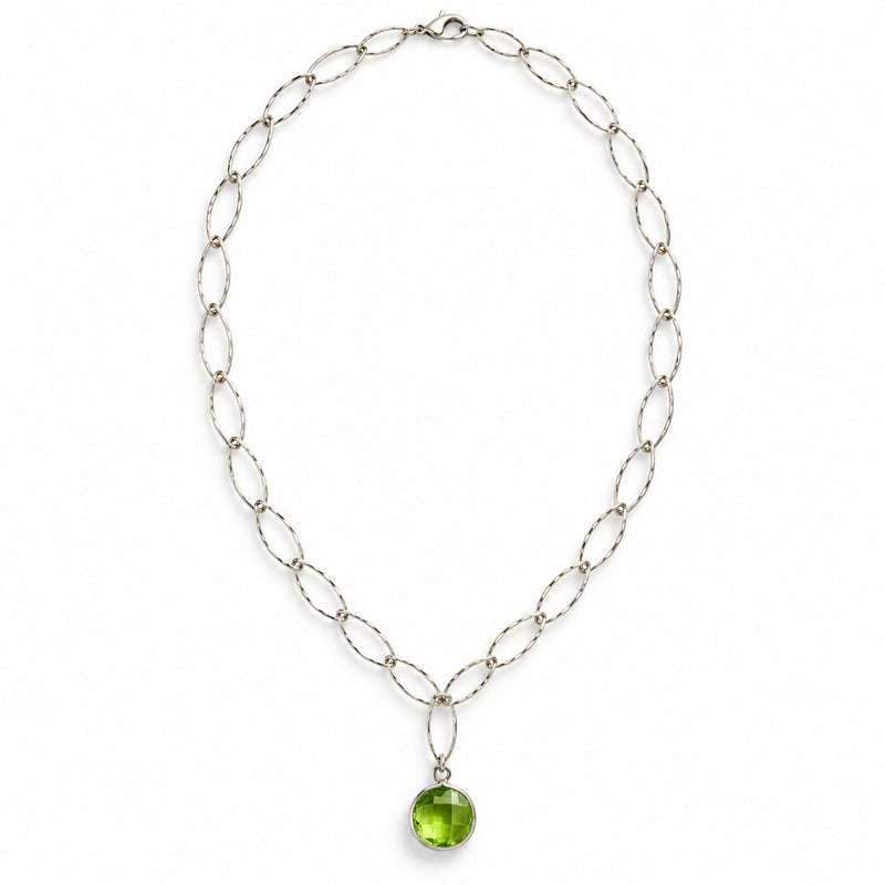 Peridot circle pendant necklace in sterling silver, front view on white background