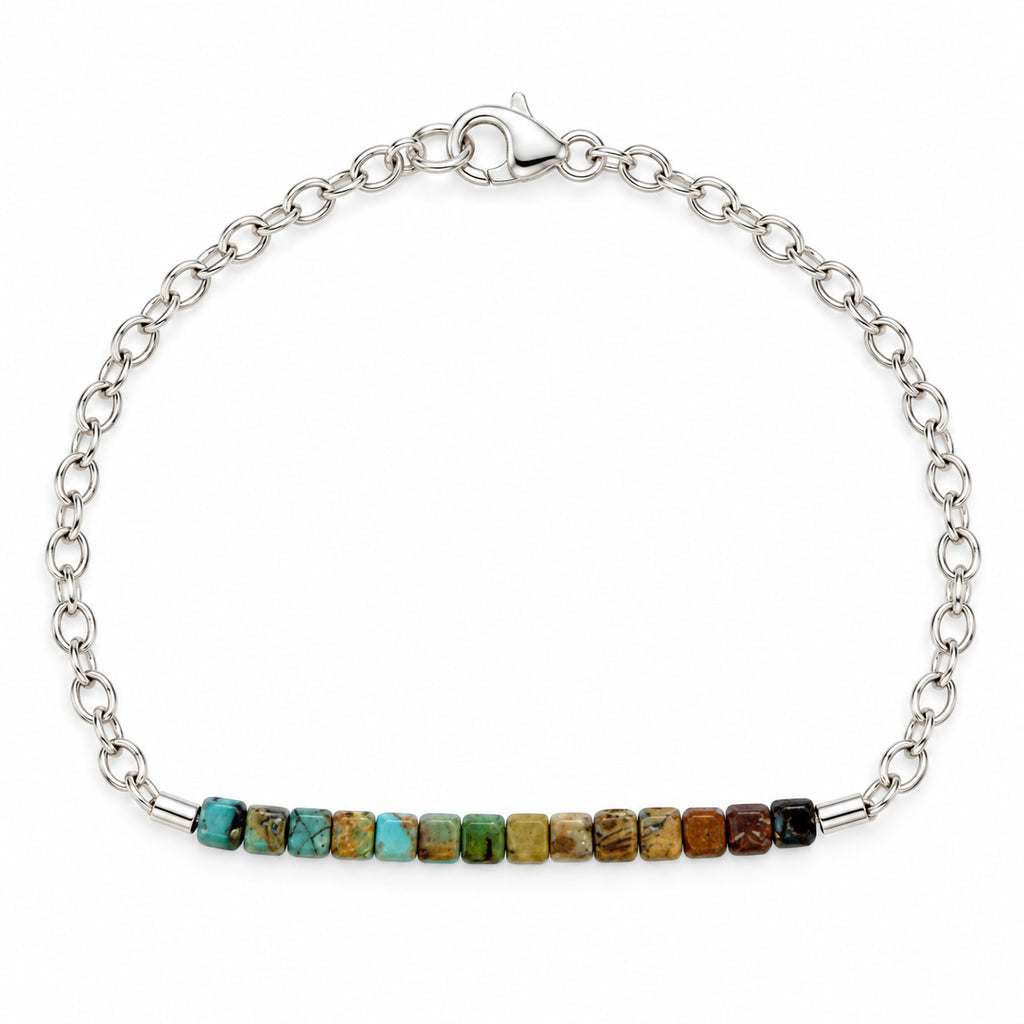 Woman wearing the turquoise gradient cube bead bracelet in sterling silver