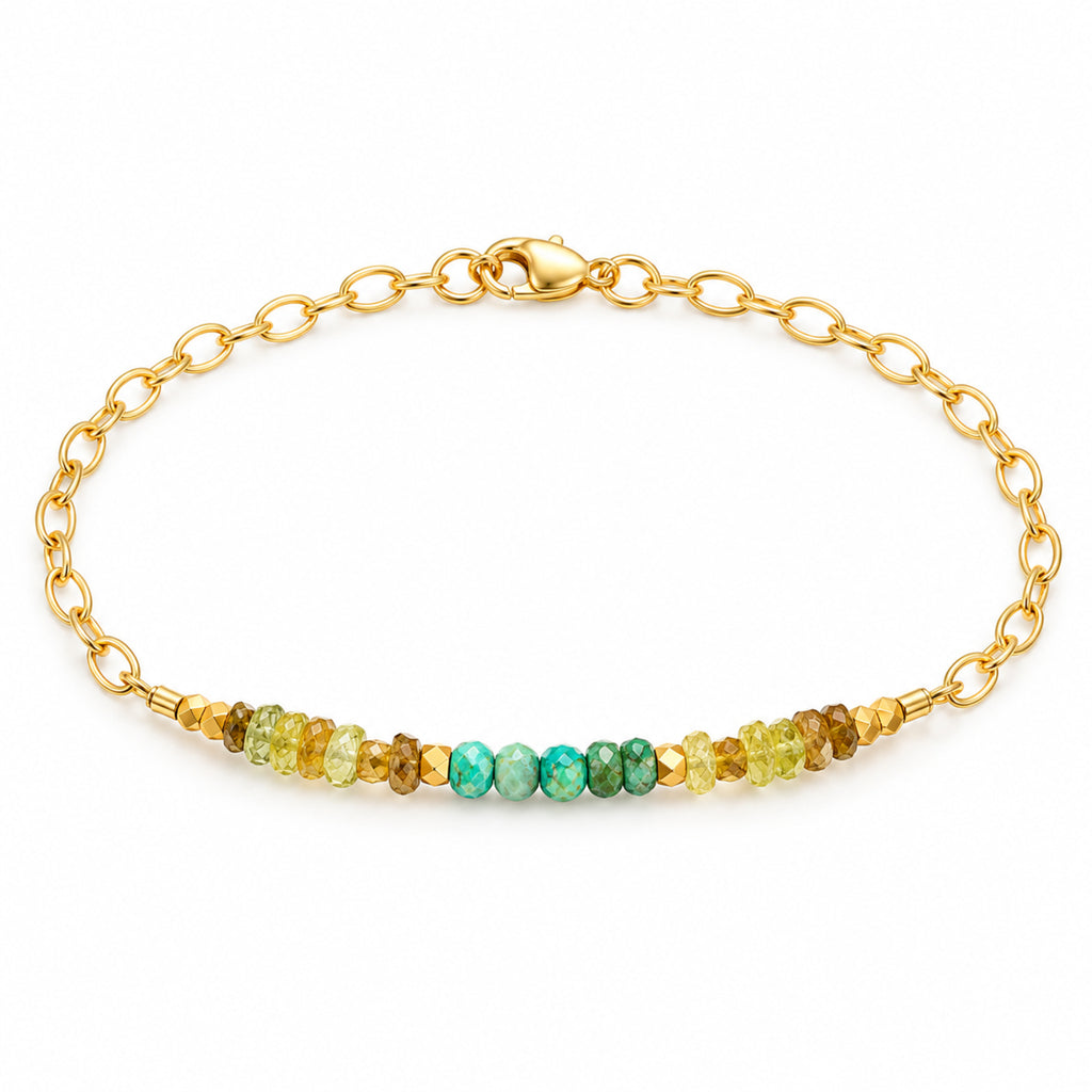 Turquoise and green garnet gold-filled beaded bracelet worn on the wrist