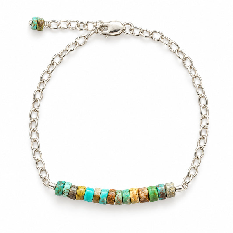 Turquoise heishi sterling silver bracelet on white background, full product view