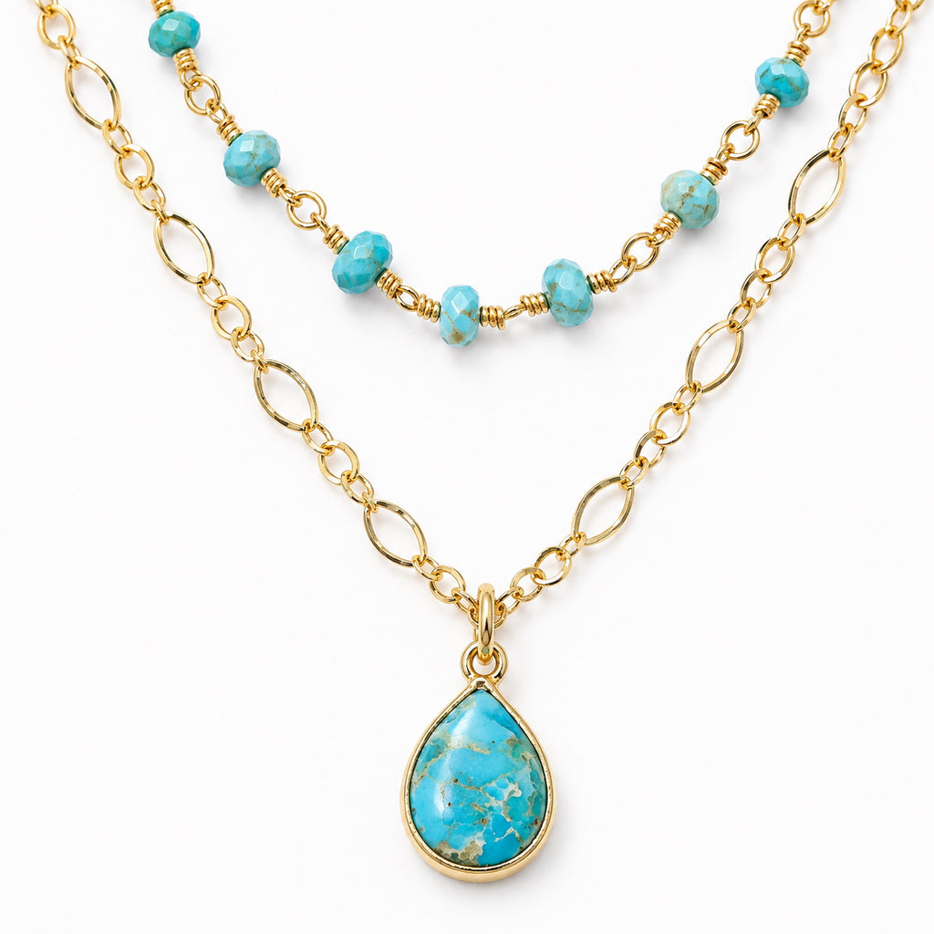 Woman wearing a turquoise rosary chain and pendant double-layer necklace